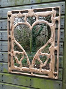 Heart design fretwork mirror by Andy Crabb Designs